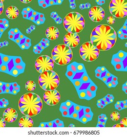 Seamless pattern with abstract flowers and elements. Items placement chaotic. Background is green.