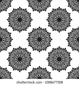 Seamless pattern with abstract flowers. Fashion textile print. Asian fabric background. Vector monochrome design. Perforation floral holes.