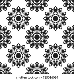 Seamless pattern with abstract flowers. Fashion textile print. Asian fabric background. Vector monochrome design. Perforation floral holes.