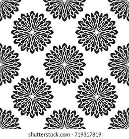 Seamless pattern with abstract flowers. Fashion textile print. Asian fabric background. Vector monochrome design. Perforation floral holes.