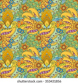 Seamless pattern of abstract flowers and paisley elements in Indian mehendi style.