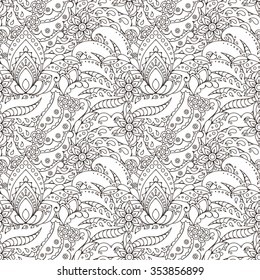 Seamless pattern of abstract flowers and paisley elements in Indian mehendi style.