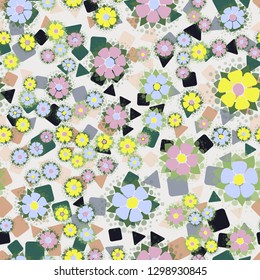 Seamless pattern. Abstract flowers. Spring paints.
Background consisting of chaos of triangles and squares. Editable.