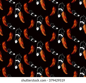 Seamless pattern with abstract indian feathers on black background.