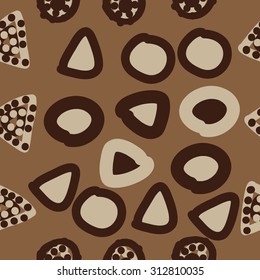 Seamless pattern of abstract motif, ellipses,bagels, spots. Handmade.
