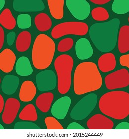 Seamless pattern abstract organic green red shapes Terrazzo mosaic style. Contemporary geometric repeating Christmas background. Modern collage elements puzzle background. For decor, fabric, wrapping.