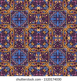 Seamless pattern. Abstract ornament of four-sided elements. Yellow, blue, purple, pink, violet.