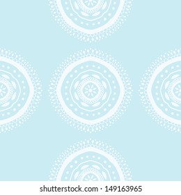 Seamless pattern with abstract ornamental circles in blue colors