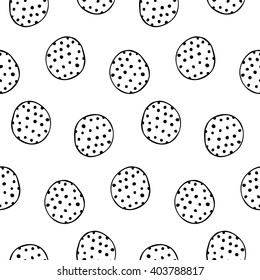 Seamless pattern of abstract outline black circles of black polka dots  on a white background. Ink doodles.