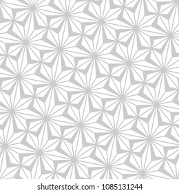 Seamless pattern with abstract palm branches. Monochrome stylish texture of repeating geometric shapes.