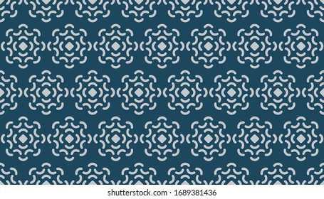 Seamless pattern of abstract shape ornament in white on top of dark background for fashion or cloth fabric textile