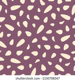 Seamless pattern with abstract shapes on a burgundy background