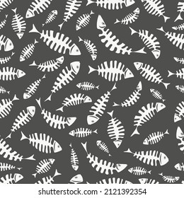 Seamless pattern with abstract skeletons of white fish on a dark gray background