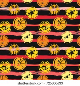 Seamless pattern with abstract slices of lemon and orange on stripes in grungy style