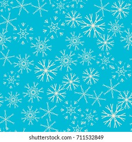 Seamless pattern with abstract snowflakes on blue background. Chaotic, random, scattered winter motives. Vector illustration.