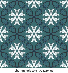 Seamless pattern. Abstract snowflakes. Openwork pattern. The diagonal cell. Drawing for the Christmas and New Year holidays. Winter textiles.