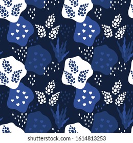 Seamless pattern. Abstract spots and floral elements, collage. Abstract natural background in trend color. Blue and white. Hand-drawn vector illustration. Modern Scandinavian flat style for fabric