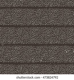 Seamless pattern of abstract strokes and dots. Vector background.