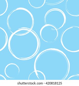Seamless pattern with abstract white circles on blue background. Wrapping background in vector EPS8 format, includes pattern swatch.