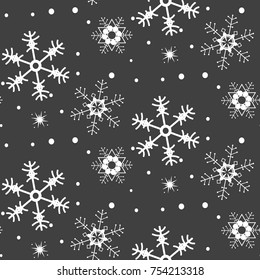 Seamless pattern. Abstract white snowflakes on a white background. Vector illustration.