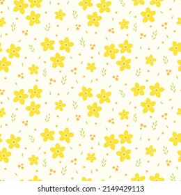 Seamless pattern of abstract yellow buttercup flowers, leaves and small orange flowers on a cream background.