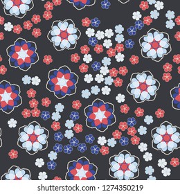 Seamless pattern. An abstraction containing large six-petal and small five-petal flowers.