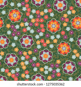 Seamless pattern. An abstraction containing large six-petal and small five-petal flowers. The background consists of small quadrangles.