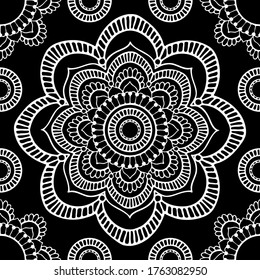seamless pattern, abstraction in monochrome colors, mandala, ornament for wallpaper and fabric, wrapping paper, background for different designs