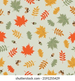 Seamless pattern with acorns and autumn leaves. Print for wallpaper, gift paper, textiles.