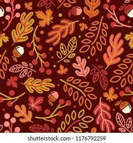 Seamless pattern with acorns and autumn oak leaves in Orange, Beige, Brown and Yellow