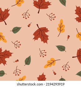 Seamless pattern with acorns and autumn oak leaves in Orange, Beige, Brown and Yellow. Perfect for wallpaper, gift paper, pattern fills, web page background, autumn greeting cards.