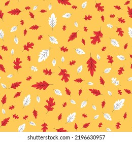 Seamless pattern with acorns and autumn oak leaves in Orange, Beige, Brown and Yellow. Perfect for wallpaper, gift paper, pattern fills, web page background, autumn greeting cards.