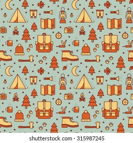 Seamless pattern with adventure travel icons.