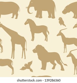 Seamless pattern with african animal silhouettes
