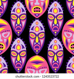 Seamless Pattern. African Seamless Pattern with Color Masks for Print or Card. Ethnic Seamless Pattern with Color Trible Shamanic Masks for your Design. Vector Texture.