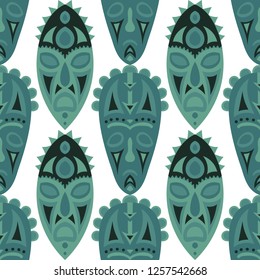 Seamless Pattern. African Seamless Pattern with Color Masks for Print or Card. Ethnic Seamless Pattern with Color Trible Shamanic Masks for your Design. Vector Texture.