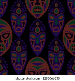 Seamless Pattern. African Seamless Pattern with Color Masks for Print or Card. Ethnic Seamless Background with Color Trible Ritual Masks for your Design. Vector Texture.