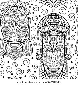 Seamless pattern with African masks. Hand drawn design for fashion, textile, fabric, wrapping paper, tiles, website wallpaper, background. Spirituality, occultism, mystic, religion, shamanism.