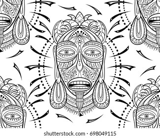 Seamless pattern with African masks. Hand drawn design for fashion, textile, fab-ric, wrapping paper, tiles, website wallpaper, background. Spirituality, occultism, mys-tic, religion, shamanism.