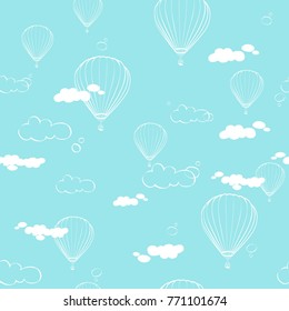 Seamless pattern with air balloons in the clouds on blue background