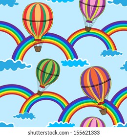 Seamless pattern with air balloons, rainbows and clouds on the blue background.