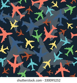 Seamless pattern with airplanes. Dark background and multicolored smaller airplanes in front. Perfect for children's bedding. Vector.