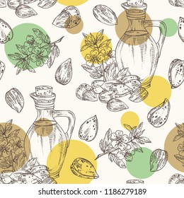 Seamless pattern with almond and bottle of almond oil. Vector hand drawn illustration