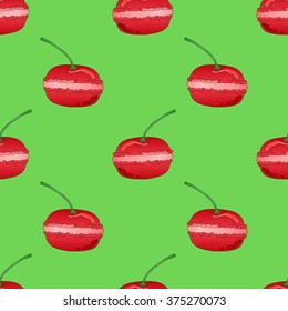 Seamless pattern with almond macaroon cookies in the form of red cherries on a green background.