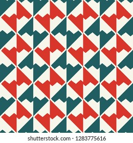 Seamless pattern with alternating geometric zigzag shapes.