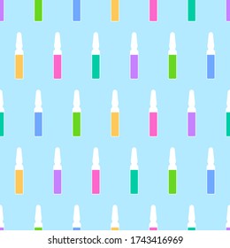 Seamless pattern from ampoules with colored liquid inside, samples of medications or cosmetic serums. Medical or beauty background