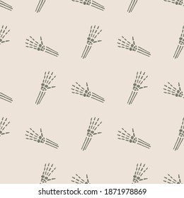 Seamless pattern with anatomical bones hand grey shapes. Outline scary prin on light background. Graphic design for wrapping paper and fabric textures. Vector Illustration.