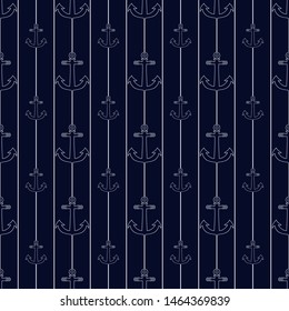 Seamless pattern with anchors and stripes on dark blue background