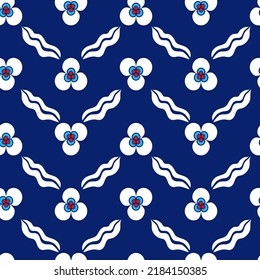 seamless pattern in the ancient Turkish style with abstract flowers on dark blue background
