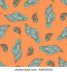 Seamless pattern with angel wings. Hand drawn doodle colored template with wings and feathers.